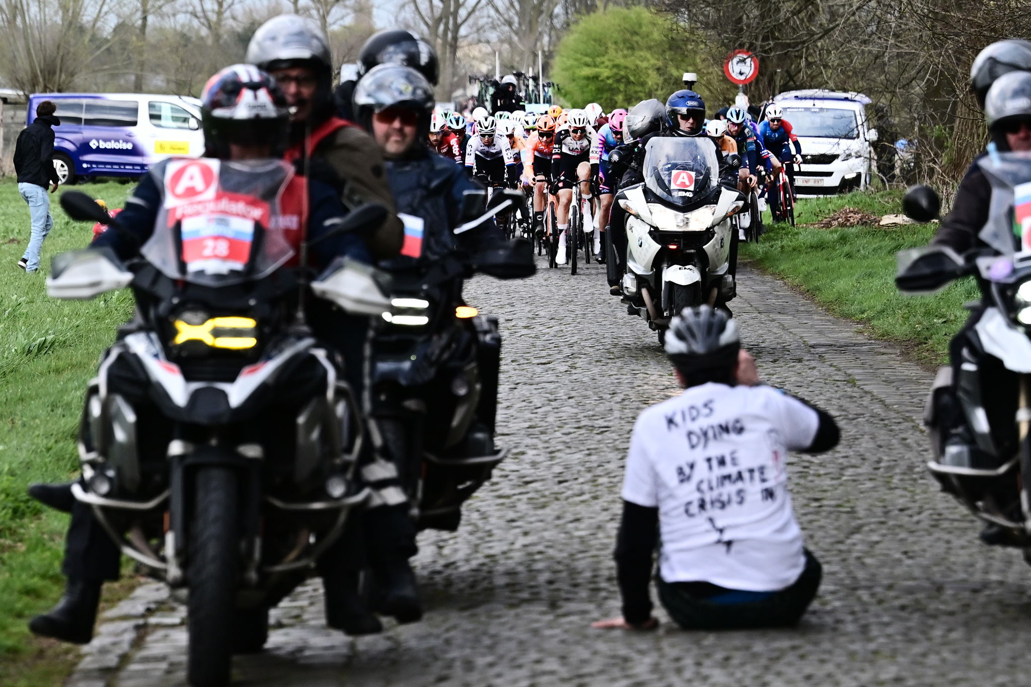 Climate activist faces investigation after disrupting Tour of Bruges