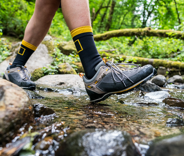 National Geographic Partners with Showers Pass, Expands Collection of Waterproof Socks and Gloves
