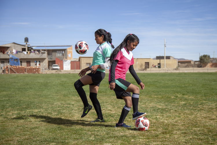 Practicing participants in a project that uses football for gender equality in Bolivia©Plan International