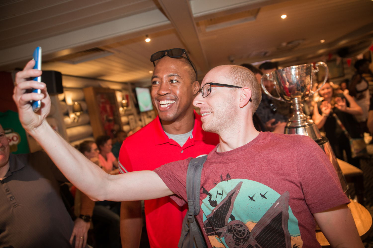 Henry Burris posing with a fan. Photo Credit: Jim Ross/CFL