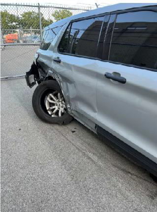 Driver's Side Damage of Troop 6 Squad Car