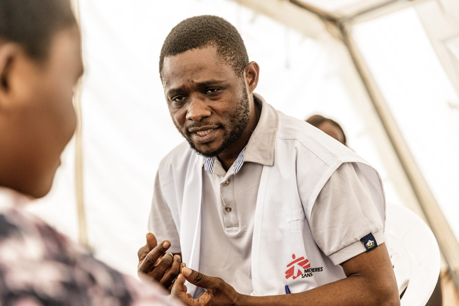 Jean Mbusu is a psychosocial counselor. In the clinic that has been established by MSF in the IDP site of Bulengo since the beginning of February 2023, he offers psychological support to survivors of sexual violence. Copyright - Michel Lunanga/MSF