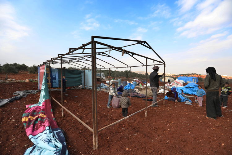 This Syrian family is building a makeshift shelter on farmland near the Turkish border. The land is owned by a farmer, who charges them $165 USD per month as rent. Without any formal camp to live in, the family has no choice but to pay. There are more than 45,000 families that have fled renewed fighting in northwest Syria in recent weeks.
Taken 12.1.2018, credit Omar Haj Kadour/MSF