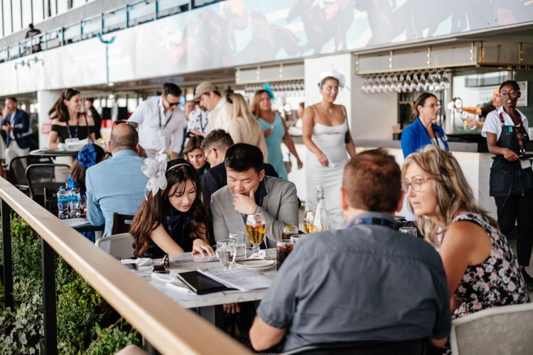 Guests on the Stella Artois Patio at The King's Plate in 2023