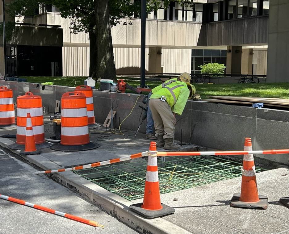 Sidewalk restoration work on Forbes Avenue at Bouquet Street Sidewalk restoration work on Forbes Avenue at Bouquet Street
