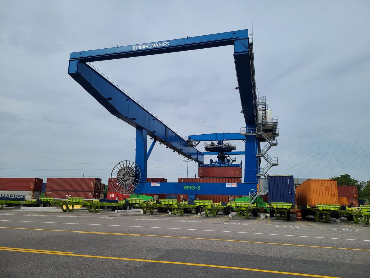 The lift heights can carry a container over a rail car stacked two containers high.