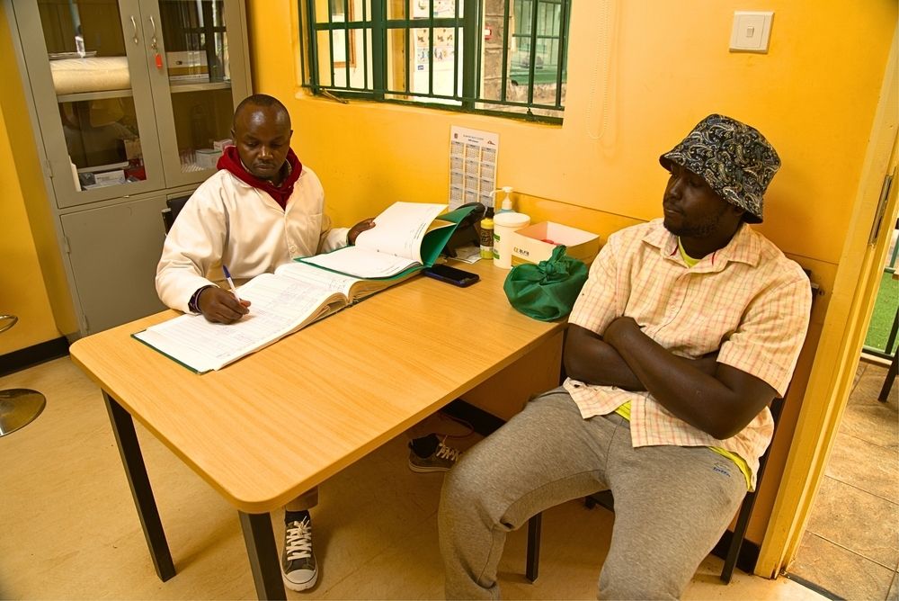 Michael in the Karuri MAT clinic laboratory for toxicology test during reviews in his visit to refill his take home doses. Michael has been in recovery for 5 years and is now reintegrated into the society. He takes home his 2-week dose of Buprenorphine. Eugene Osidiana | Location: Kiambu |Date: 07/05/2024